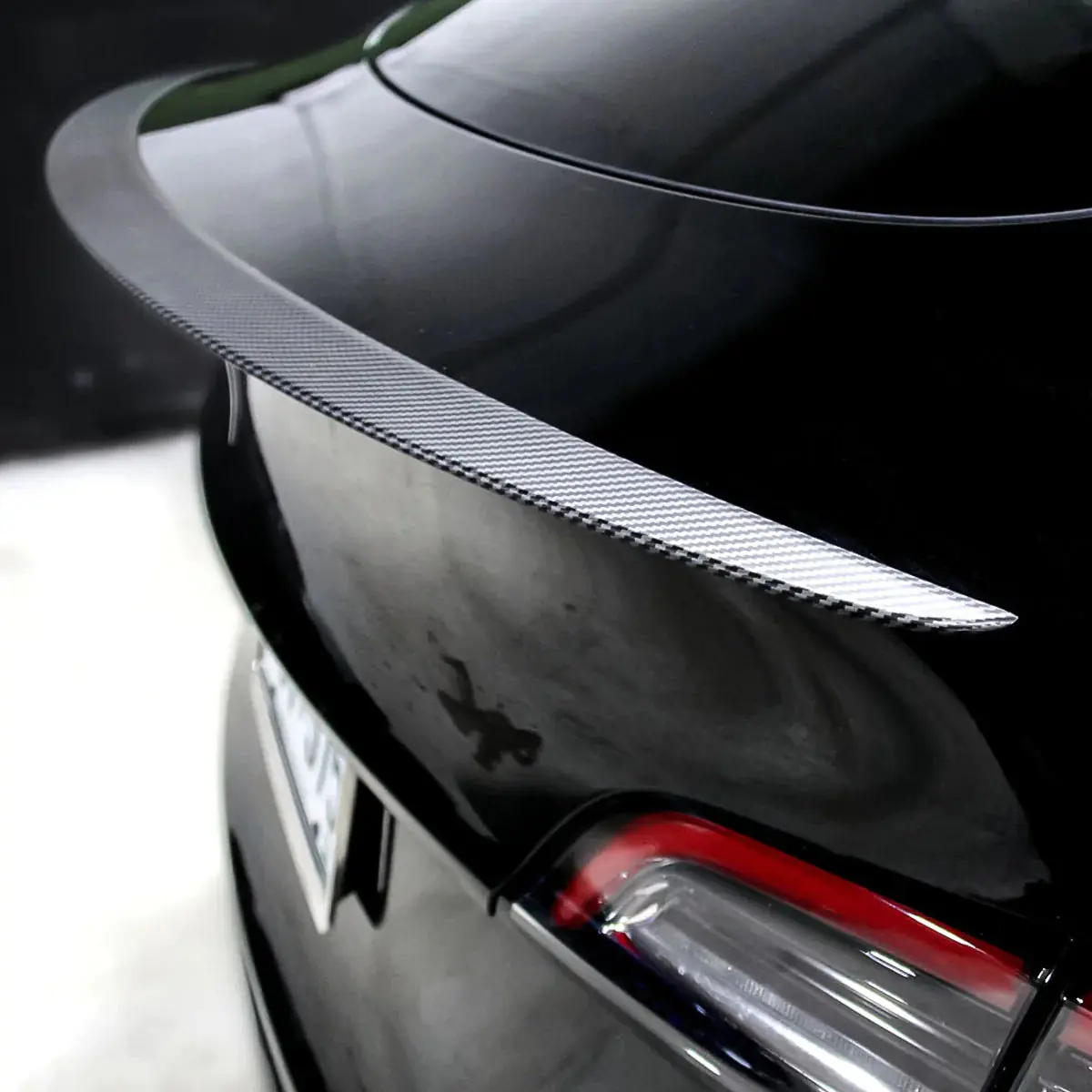 Upgrade Your Tesla Model Y's Style and Aerodynamics with a Carbon Fiber Rear Spoiler