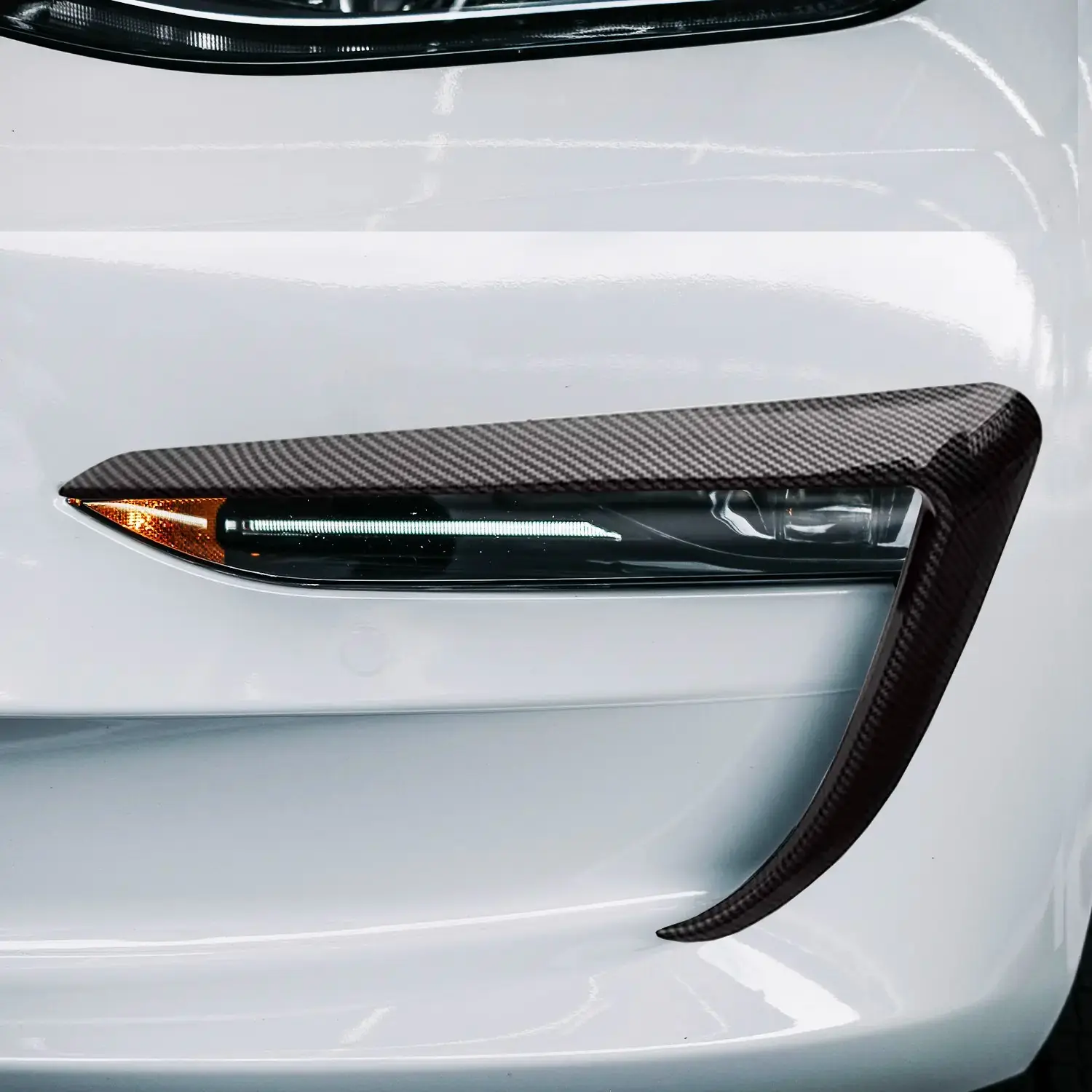 Enhance the Look of Your Tesla Model 3 with Adreama's Premium Dry Carbon Fiber Fog Light Trim Cover