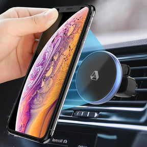 MagSafe Phone Car Mount, Three-quarter Angle View, Cell Phone Holder for Car showing Magnetic Hold on an iPhone.
